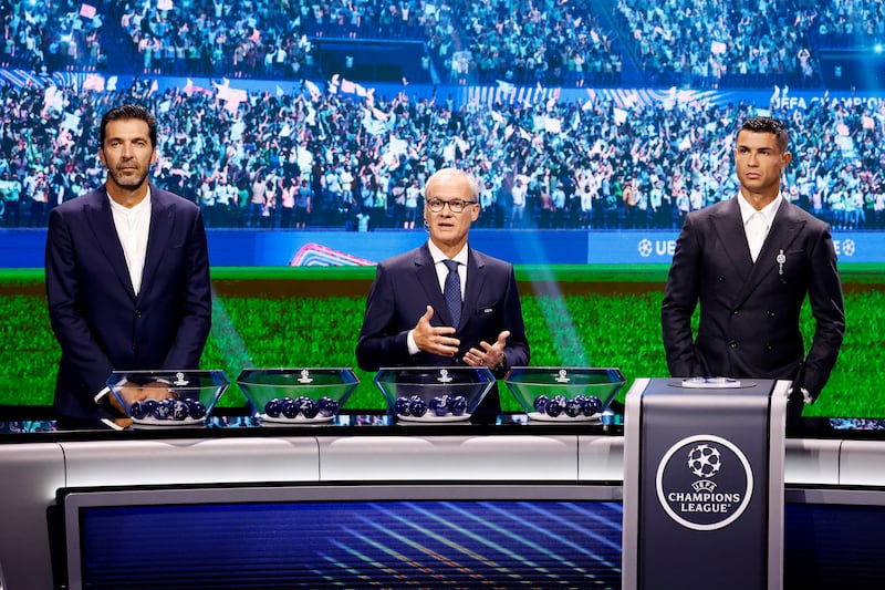 Gianluigi Buffon, Giorgio Marchetti and Cristiano Ronaldo. Photograph: Claudio Lavenia/UEFA via Getty
