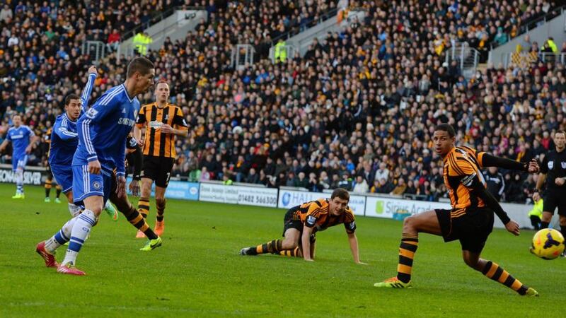 Chelsea’s Eden Hazard  shoots and scores  against Hull City. Photograph: Nigel Roddis/Reuters