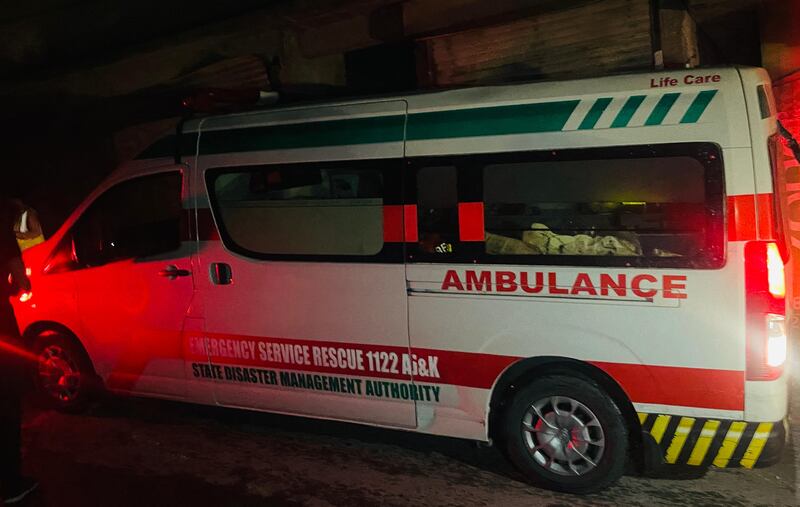 An ambulance arrives near the site of a strike in Muzaffarabad. Photograph: Sajjad Qayyum/Getty