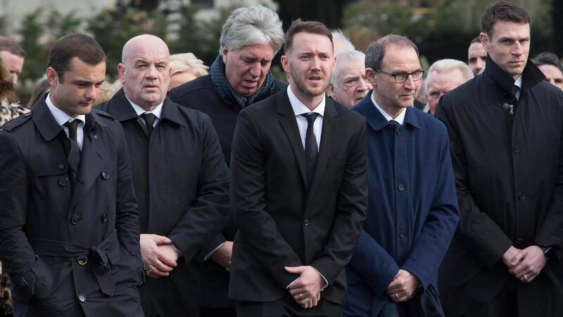 Shaun Maloney (left), Aiden McGeady (centre) and Martin O’Neill (second right) attend the funeral of former Republic of Ireland footballer Liam Miller, at St John the Baptist Church in Ovens, Co Cork. Photograph: Clare Keogh/PA Wire