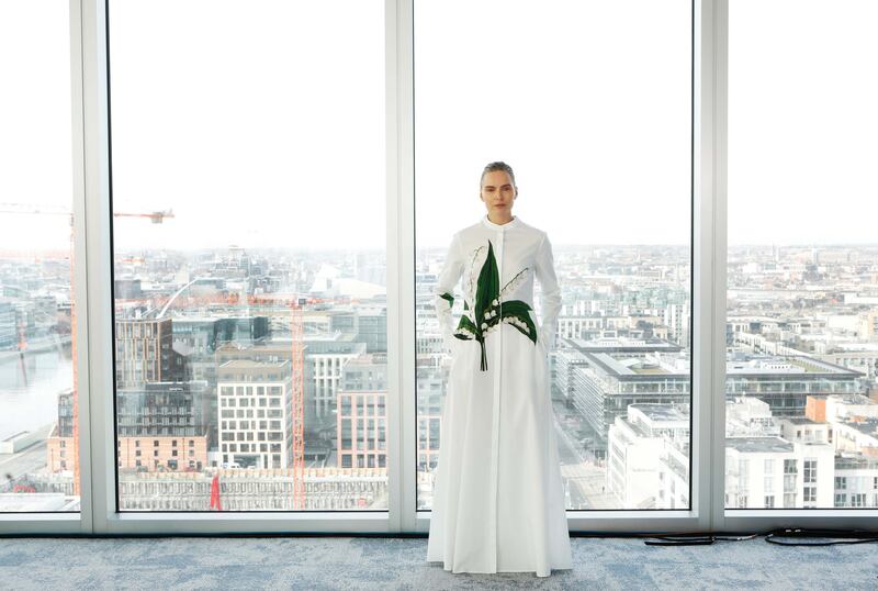 An Oscar de la Renta white t-shirt dress with an ornamental bold green flourish. Photograph: Leon Farrell/Photocall Ireland