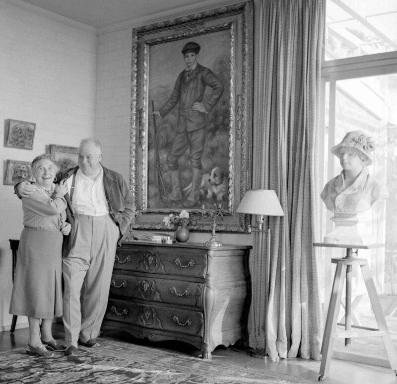 Father and son: Jean Renoir with Pierre-Auguste’s painting of him as a boy, in a photograph by Sanford Roth. Courtesy UCLA Library Special Collections