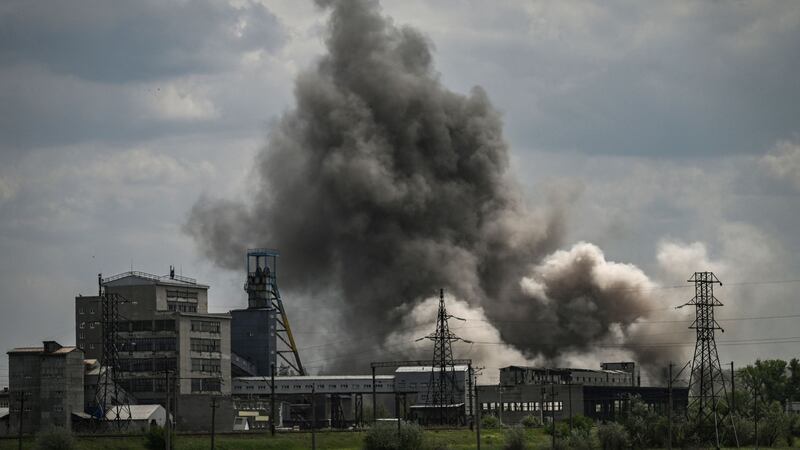 Smoke and dust spreads after an air  strike at a factory in the city of Soledar, Donbas, Ukraine. Photograph: Aris Messinis/AFP/Getty