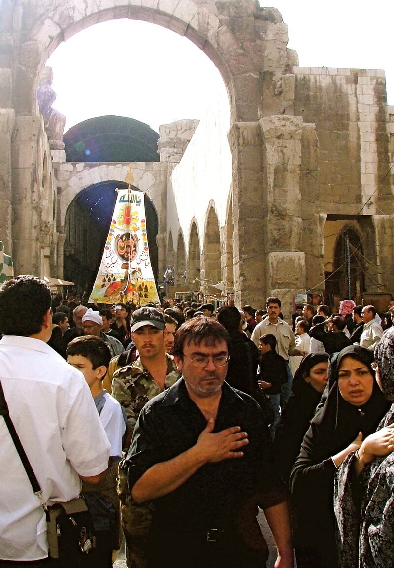Shi’a pilgrims enter the exterior courtyard of the Umayyad Mosque, Damascus (715 CE) in 2005, processing toward the 13th-century shrine of the head of al-Husayn inside the mosque. Al-Husayn was a grandson of the Prophet Muhammad and a beloved Shi’a Imam. Photograph: Stephennie Mulder