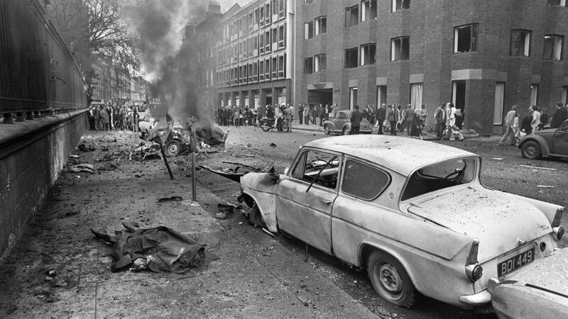 A victim of the South Leinster Street bombing lies on the footpath near the car that exploded. Photograph: Tom Lawlor