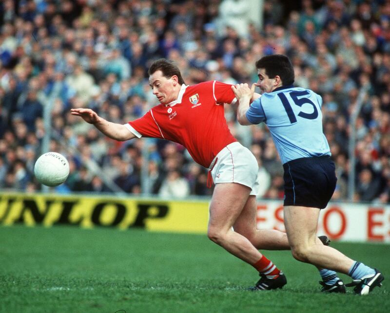 Cork's Niall Cahalane and Alan McNally of Dublin battling for a loose ball in the National League final in 1989. Photograph: Billy Stickland/Inpho