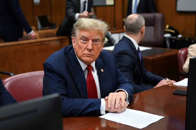 Former US president Donald Trump attends the first day of his trial for allegedly covering up hush money payments linked to extramarital affairs, at Manhattan Criminal Court in New York City. Photograph: Angela Weiss/AFP via Getty Images