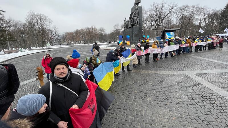 Ukrainians gather for Unity Day celebrations at a monument to writer Taras Shevchenko in Kharkiv, eastern Ukraine, and to denounce the threat of new Russian aggression. Photograph: Daniel McLaughlin