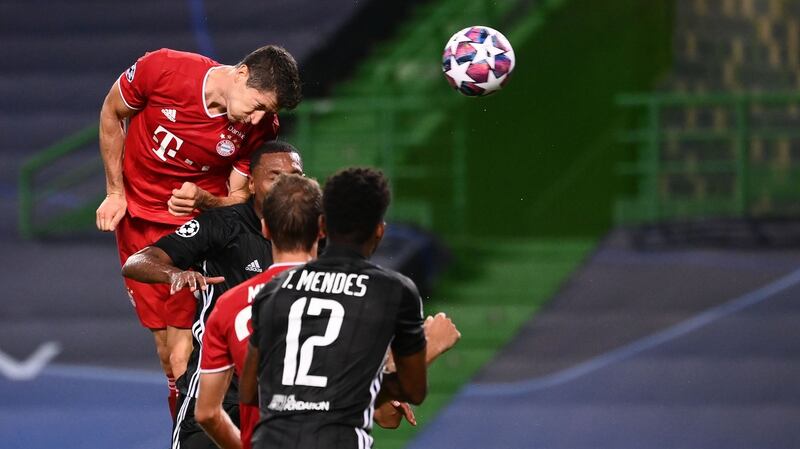 Robert Lewandowski heads home Bayern Munich’s third goal in the Champions League semi-final against Lyon at the Jose Alvalade stadium in Lisbon. Photograph:  Franck Fife/AFP via Getty Images