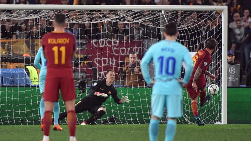 Daniele De Rossi scores a penalty to put Roma 2-0 ahead. Photo: Andreas Solaro/Getty Images