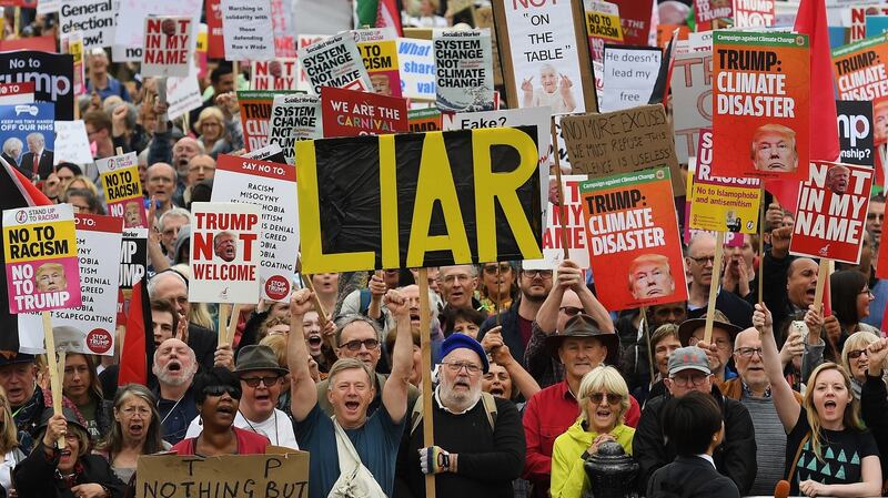 People take part in n anti-Trump protest at Trafalgar Square in London. Photograph: Andy Rain/EPA