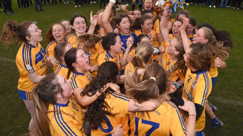 The Knockmore ladies senior football team celebrate with the county senior football championship trophy after they ended Carnacon’s 22-year reign as Mayo champions   at James Stephens Park, Ballina, last Sunday. Photograph: David Farrell.