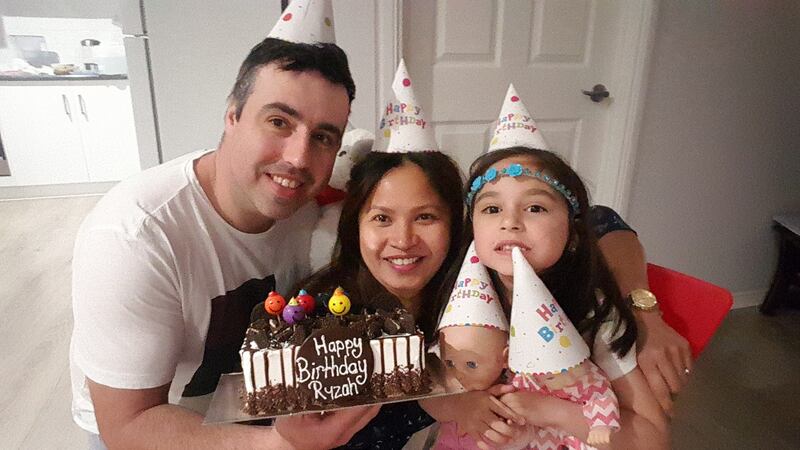 Jude Margey with his wife Grace and their daughter  Ryzah