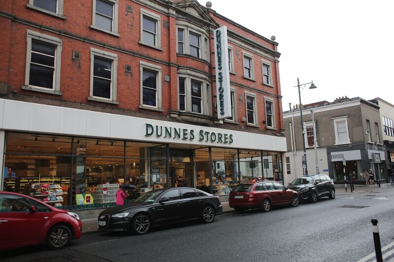 Dunnes Stores owns a number of shops on the town's main street that have lain empty for a some time, angering locals. Photograph: Bryan O’Brien