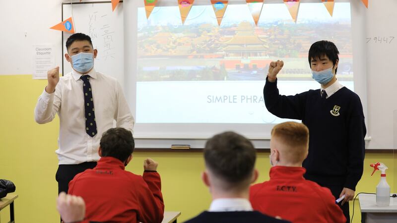 Leo Wang and Benjamin Yang, students at Templeogue College, Dublin, teaching Mandarin to their transition-year class as part of a series of #ThinkLanguages events held this academic year. Photograph: Julien Behal