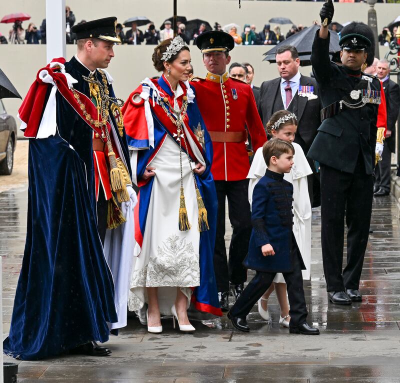 Prince William, Prince of Wales, Catherine, Princess of Wales, Prince Louis and Princess Charlotte arrive for the Coronation of King Charles III and Queen Camilla at Westminster Abbey. Photograph: Andy Stenning/ WPA Pool/Getty Images