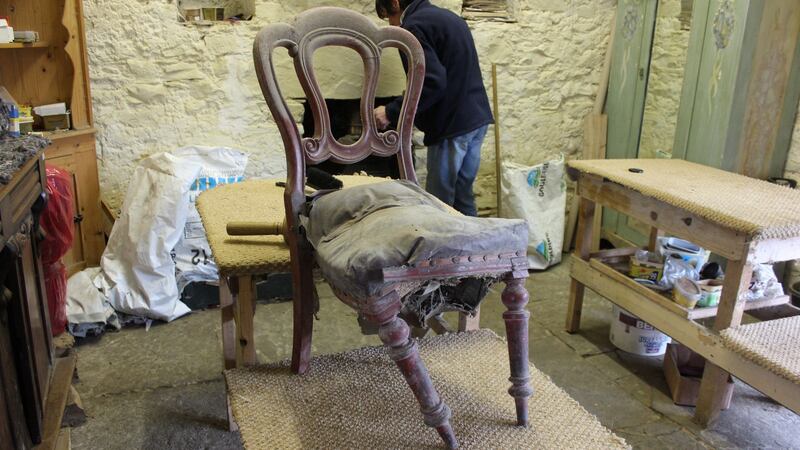 An old chair in the process of restoration at Clooneenagh House