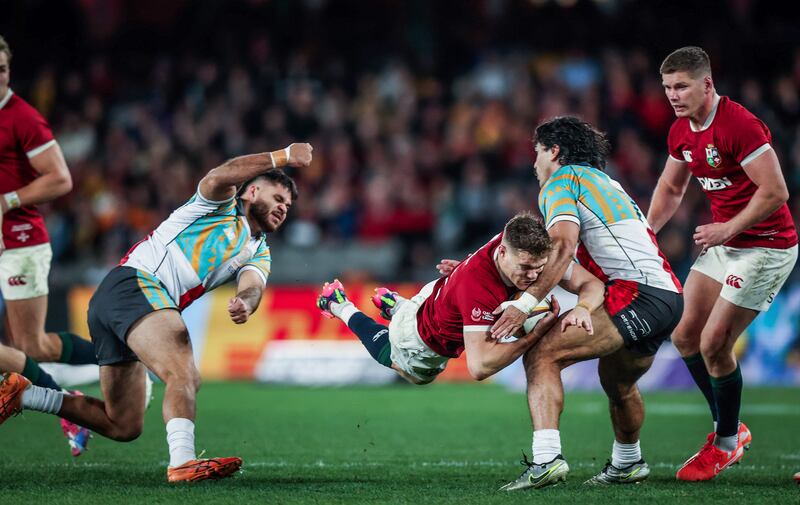 Garry Ringrose is tackled by Charlie Gamble of the First Nations and Pasifika XV. Photograph: Tom Maher/Inpho