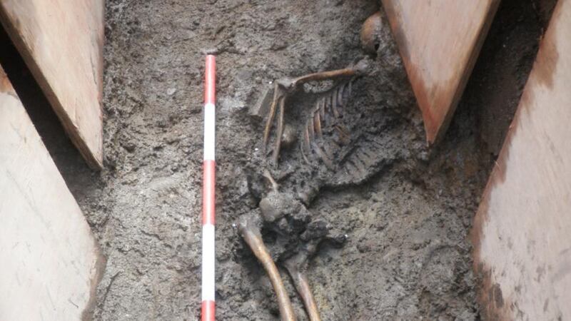 The ancient remains of at least five people were uncovered during Luas work excavations outside Trinity College last month. Photograph: Rubicon Heritage Services