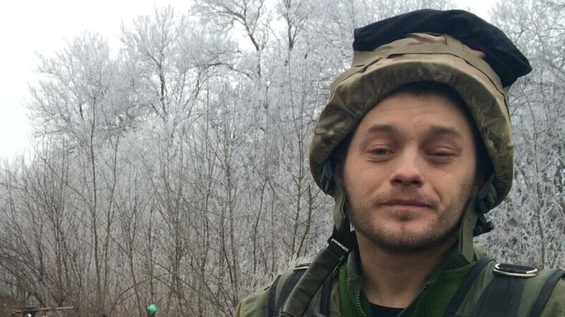 Ukrainian army soldier Vitaly (31) with other troops about 30km from Debaltseve. Photograph: Daniel McLaughlin