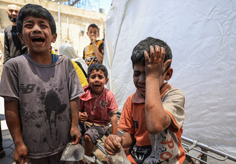Wounded Palestinian children and babies are brought to the al-Ahli Baptist Hospital after an attack by the Israeli military on the Zaytoun Quarter of Gaza Strip on May 29th. Photograph: Dawoud Abo Alkas/Anadolu via Getty Images