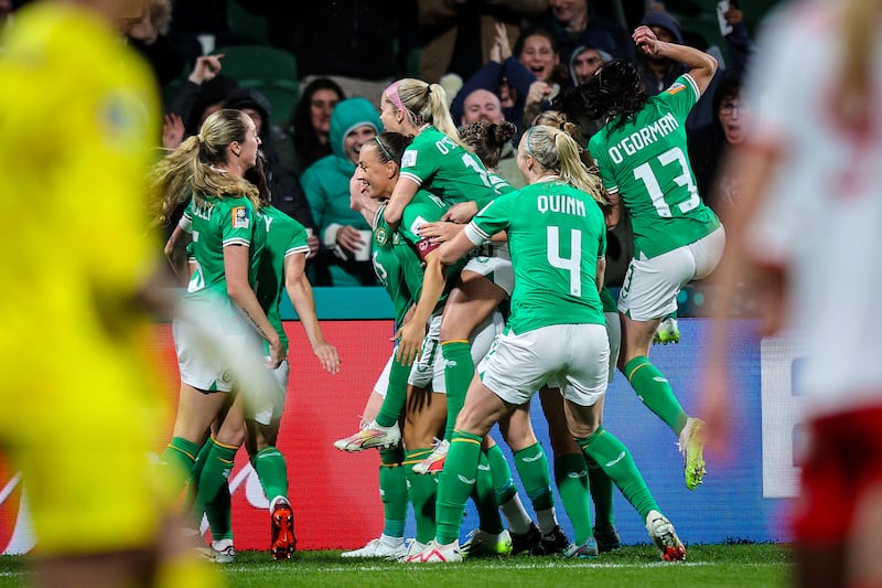 Katie McCabe and her team-mates celebrate the Republic of Ireland's early goal against Canada at the Perth Rectangular Stadium, Perth, Australia. Photograph: Ryan Byrne/Inpho 