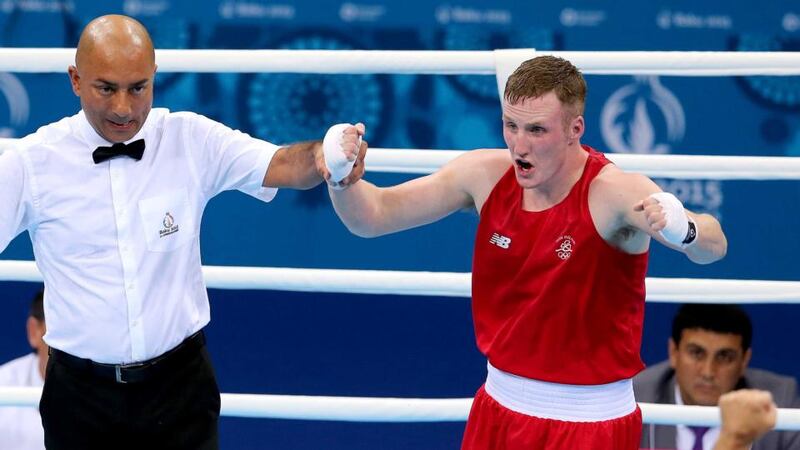 Ireland’s Michael O’Reilly celebrates victory in the Men’s Middle 75kg final in Baku. Photograph: Ryan Byrne/Inpho