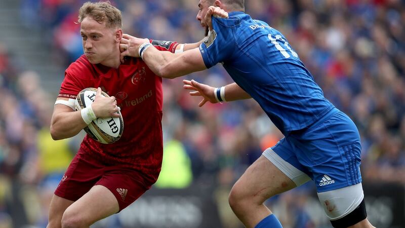 Munster’s Mike Haley is tackled by Robbie Henshaw of Leinster. Photograph: Dan Sheridan/Inpho