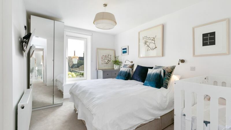 Main bedroom with door to balcony