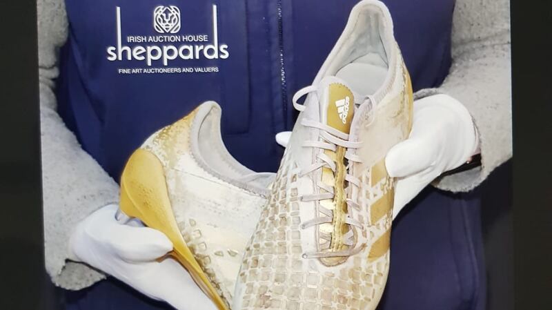 The bashed-up boots were delivered to the auctioneer in a Dunnes bag