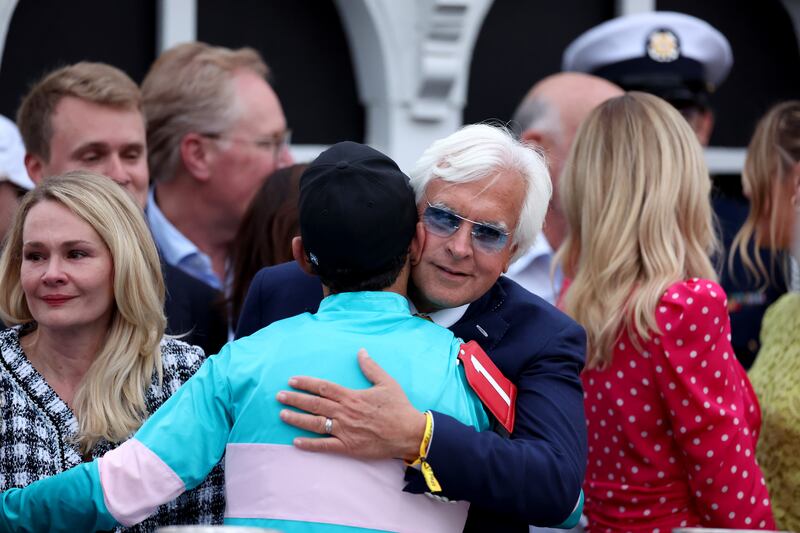 Trainer Bob Baffert congratulates jockey John Velazquez after winning the Preakness Stakes. Photograph: Rob Carr/Getty Images