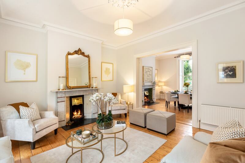 The reception rooms lie to the front of the house