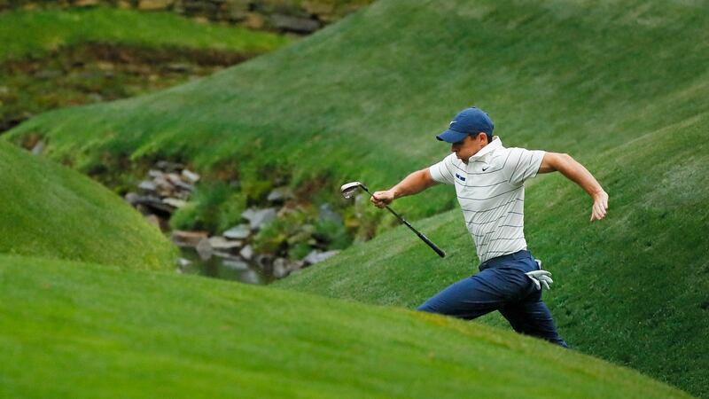 Rory McIlroy  jumps across Rae’s Creek on the 13th hole during the second round of the 2019 Masters at Augusta National Golf Club. Photograph: Kevin C Cox/Getty Images