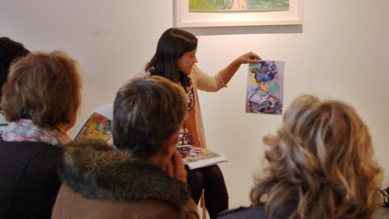 Education curator Bairbre-Ann Harkin leads a discussion about May Guinness’s wild use of colour during a guided visit in Butler Gallery. Photograph: Ailis Feehan. Image courtesy of Butler Gallery