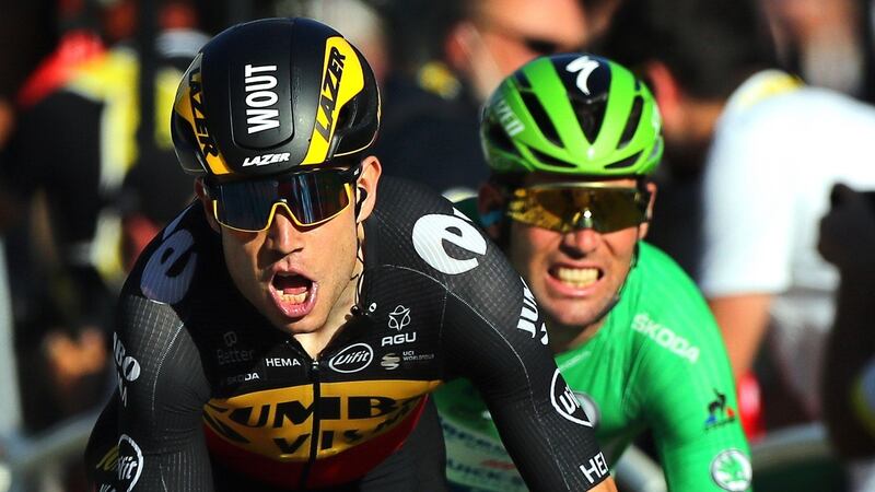 Wout Van Aert (left) of Team Jumbo Visma crosses the finish line to win the 21st stage of the Tour de France ahead of British rider Mark Cavendish of the Deceuninck QuickStep team. Photograph: EPA/Christophe Petit-Tesson epa09352349 Belgian rider Wout Van Aert (L) of Team Jumbo Visma crosses the finish line to win the 21st stage of the Tour de France 2021 over 108.4 km from Chatou to Paris, France, 18 July 2021. At right British rider Mark Cavendish of the Deceuninck Quick-Step team.  EPA/CHRISTOPHE PETIT-TESSON