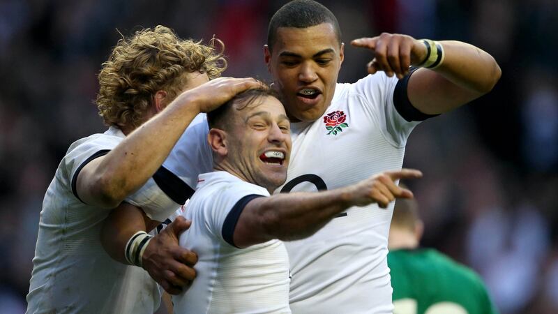Danny Care celebrates his try.