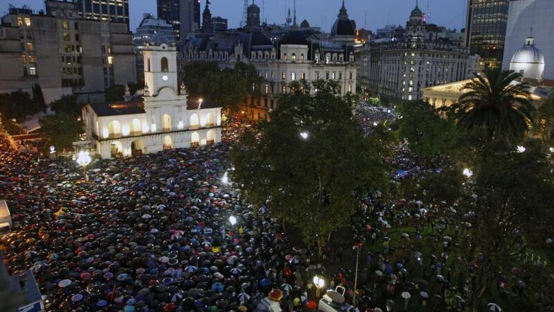 People gather at Plaza de Mayo square in Buenos Aires on Wednesday to remember   prosecutor Alberto Nisman. The so-called March of Silence was organised by colleagues of Nisman to mark the one month anniversary of his death. Photograph: Emiliano Lasalvia/AFP/Getty Images