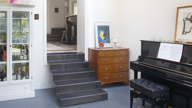 Steps down to the kitchen/dining area.