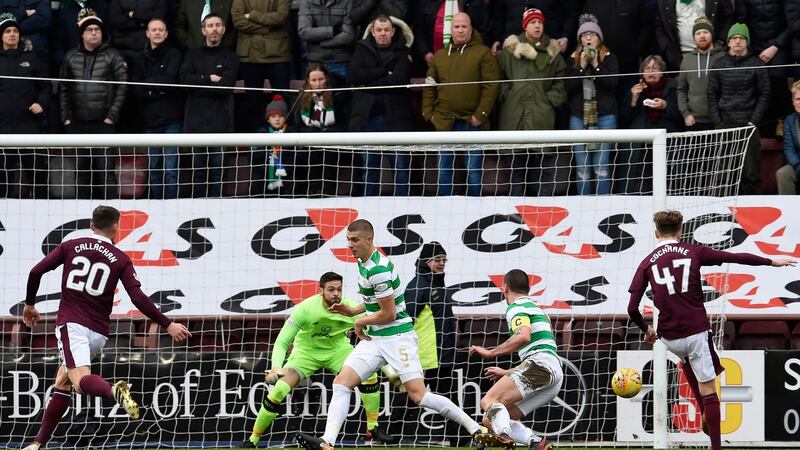 Harry Cochrane strikes the opening goal of the game. Photo: Ian Rutherford/PA Wire