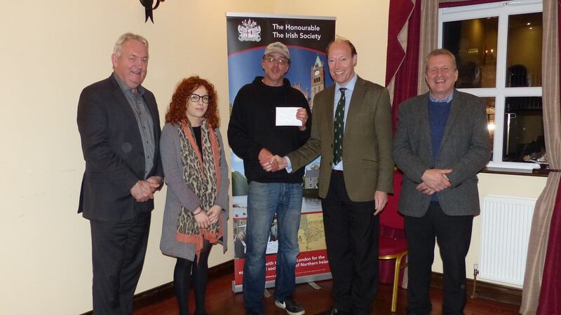 Bonanza festival contest winner Johnny Keith, centre, with councillors Sean McPeake, Niamh Milne, Ian Milne and Edward McGomery