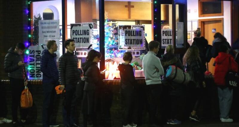 People queue to vote in the general election in London. Photograph: Hannah McKay/Reuters