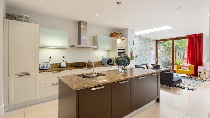 Kitchen/dining/family room looking towards the back