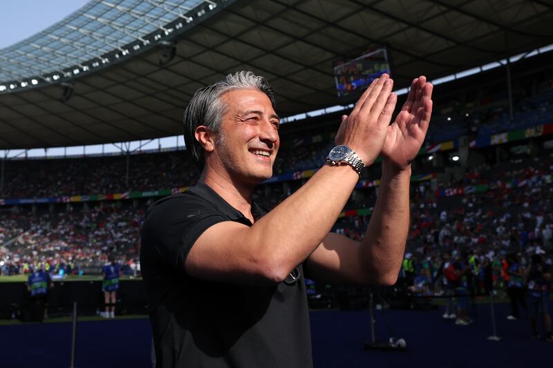 Switzerland manager Murat Yakin applauds fans before their last-16 clash with Italy at Olympiastadion in Berlin, Germany. Photograph: Alex Grimm/Getty Images