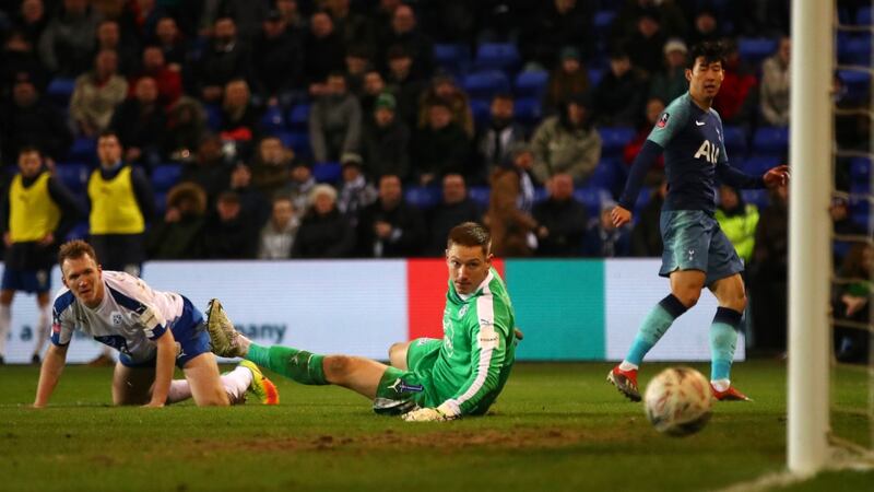 Heung-Min Son sends home Spurs’ fourth. Photo: Clive Brunskill/Getty Images