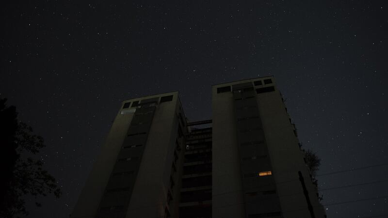 An apartment building stands during a power outage in the Palos Grandes district of Caracas. Photograph: Carlos Becerra/Bloomberg