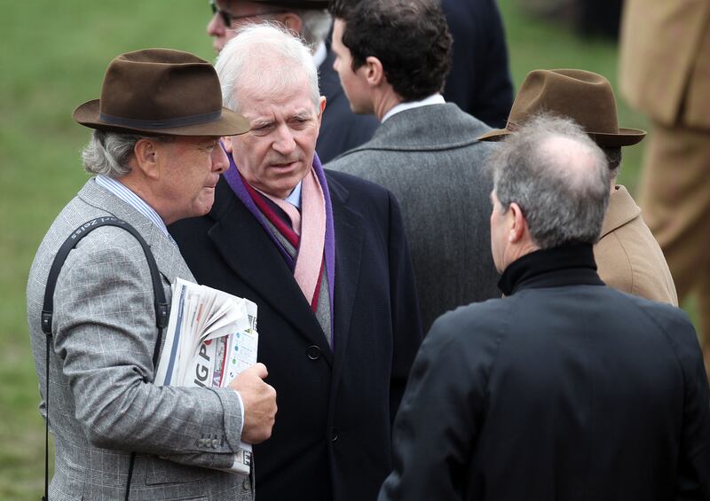 Trainer Edward O'Grady, former European Commissioner Charlie McCreevy and JP McManus at the Cheltenham Festival in 2012. Photograph: Dan Sheridan/Inpho