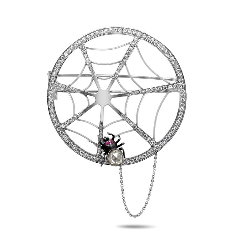Platinum spider web diamond brooch