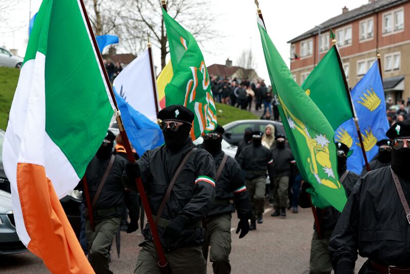 A colour party at the City Cemetery in Derry, after their Easter Monday parade through the Creggan area of the city. Photograph: Liam McBurney/PA Wire