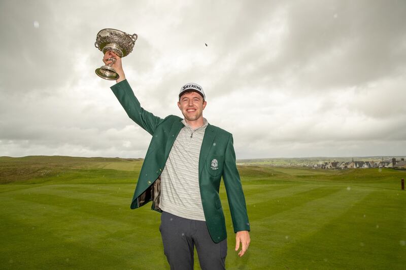 Hugh Foley of Royal Dublin celebrates his victory in the South of Ireland Amateur championship at Lahinch. Photograph; Natasha Barton/Golffile.