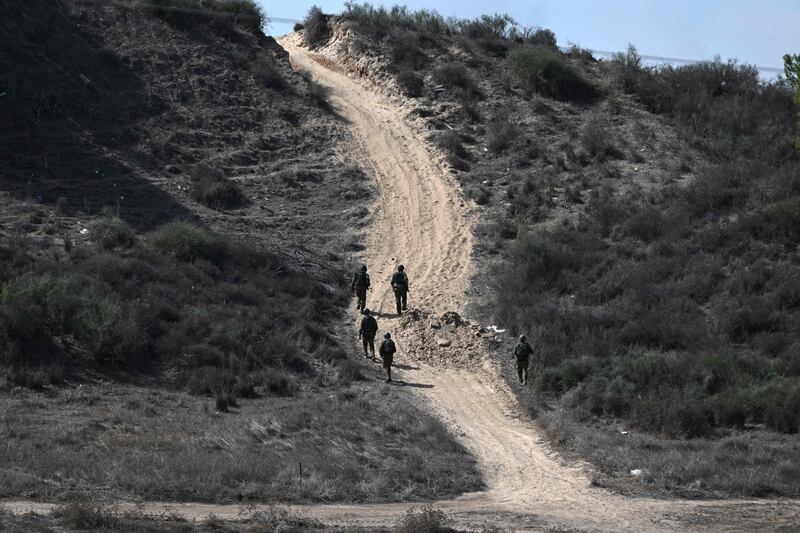 Israeli soldiers patrolling close to the Gaza Strip border. Photograph: ARIS MESSINIS/AFP via Getty Images